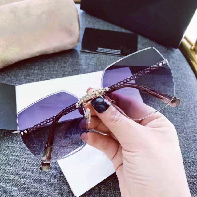 Designer Fashion Oval Rimless Sunglasses Glasses Fashion Men Women UV400 Sunglasses